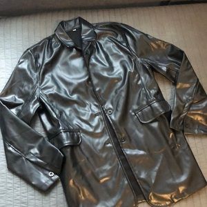 FAUX leather jacket w/ two front buttons w/pockets. Women’s size Large.